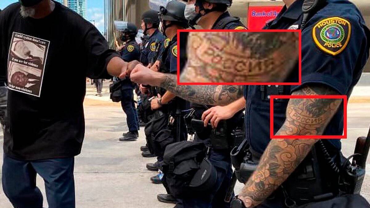 Полицейский с татуировкой